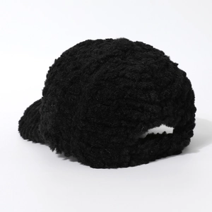 Thick furry black baseball cap in solid color with warm plush teddy fleece texture