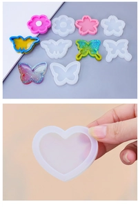 Silicone molds for resin crafts featuring cherry blossom, butterfly, and heart designs