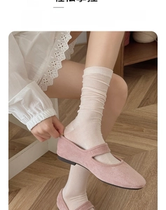 Close-up of thin breathable cream slouch socks paired with pink Mary Jane shoes