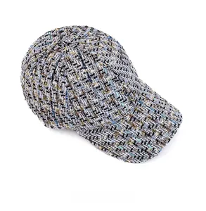 Top view of tweed baseball cap showing detailed colorful woven fabric and 6-panel structure