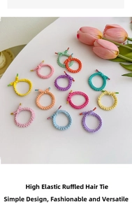 Flat lay of colorful high-elastic lace knotted hair ties in various macaron shades