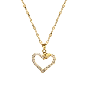 Luxurious gold heart pendant necklace with shimmering crystals on a sleek titanium chain