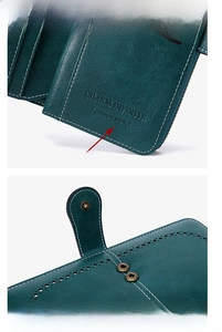 Detail view of dark green leather wallet with white stitching and brand embossing