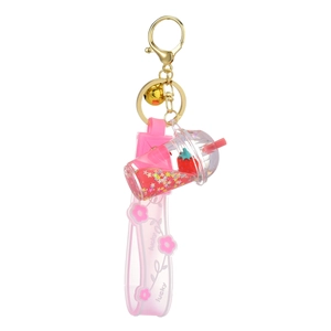 Creative pink floating strawberry acrylic keychain with liquid stars and lucky wrist strap