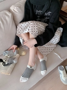 Close-up of low cut striped cotton liner socks with cute embroidered heart detail