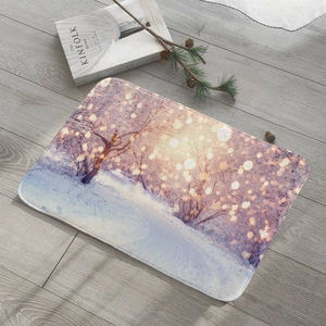 Absorbent flannel rug featuring a romantic snowy landscape with soft lavender and white tones