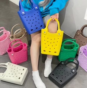 Selection of waterproof EVA tote bags with cutout hole design in multiple vibrant colors