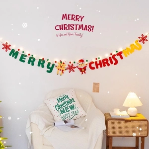 LED Merry Christmas felt banner with reindeer and Santa icons hanging on a white wall