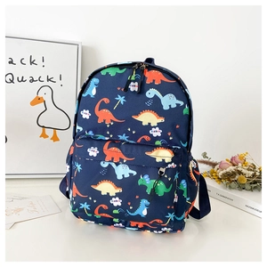 Detail of navy blue canvas kids dinosaur backpack with colorful cartoon prints and zippers