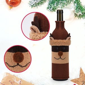Close-up of knit reindeer wine bottle cover featuring 3D antlers and plush textures