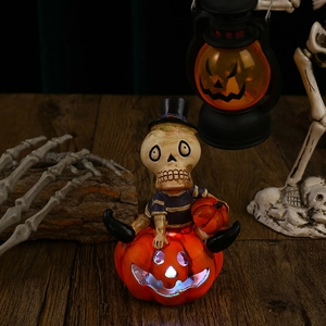 Luminous skeleton on pumpkin lamp with glowing cutout eyes for Halloween decor