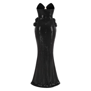 Detailed back view of black sequin mermaid evening gown with floral accents