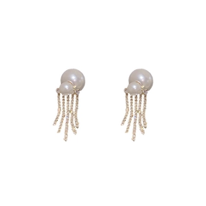Elegant gold pearl earrings with sparkling crystal tassels on a clean white background