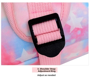 Close-up of adjustable pink shoulder strap with buckle on starry sky printed backpack