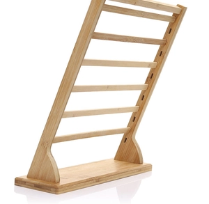 Detail of multi-tier bamboo jewelry stand showing natural wood grain and stable structure