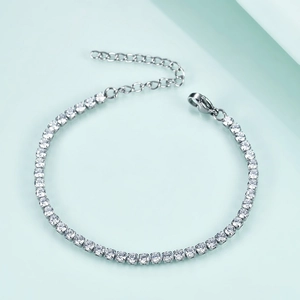 Detailed shot of silver tennis bracelet with cubic zirconia and adjustable lobster clasp