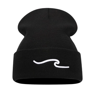 Classic black knitted beanie with white wave embroidery and cuffed design for winter