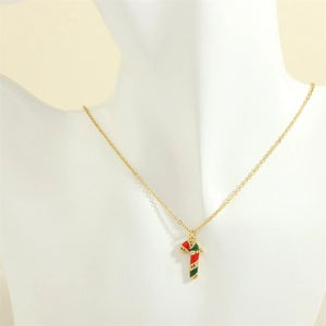 Detail of Christmas candy cane necklace with red and green enamel and crystal accents