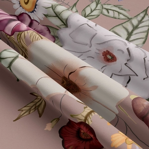 Detailed close-up of floral tapestry fabric with intricate vintage botanical patterns