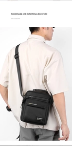 Vertical nylon messenger bag with adjustable strap shown on model for size perspective