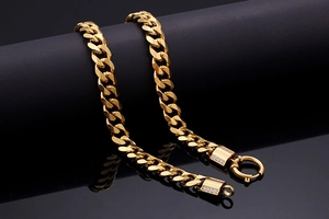 Close-up of 18K gold plated Cuban chain link with micro-pave zircon rectangular clasp