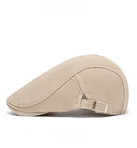 Side view of khaki flat cap in breathable canvas with adjustable metal buckle detail