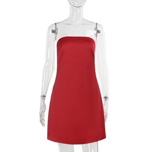Detail of red satin tube mini dress with a slim A-line fit and elegant glossy finish
