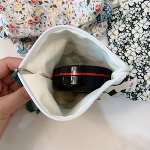 Floral and checkerboard cotton mini pouches showing inner space for cosmetics