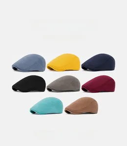 Detailed grid layout showing multiple colors of corduroy cotton newsboy caps for autumn