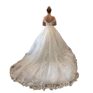 Elegant white lace mermaid wedding dress with long train and off-shoulder floral details