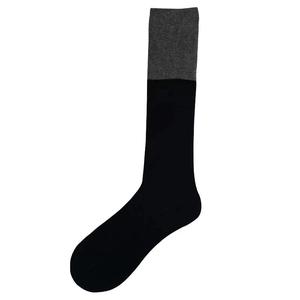 Two-tone knit over-the-knee socks in black and grey color block minimalist style