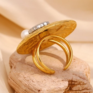 Exaggerated 18K gold plated stainless steel starfish ring with a white pearl on stone