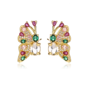 Macro detail of 18K gold plated butterfly stud earrings with colorful zircon stones