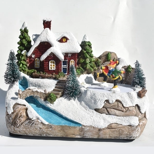 Détails d'une maison de Noël à LED avec scène de patinage animée et décor de neige
