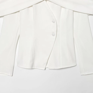 White off-shoulder blazer with asymmetrical hem and two buttons in a slim fit design