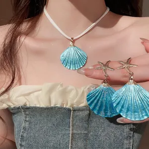 Blue seashell pendant necklace and starfish earrings set for women beach vacation style