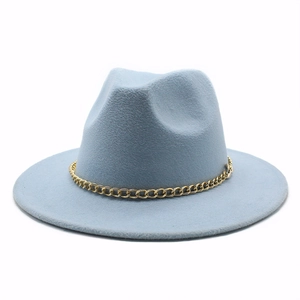 Detail of light blue wool fedora hat with a bold decorative gold metal chain accessory