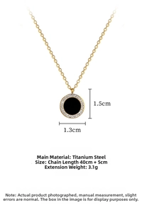 Detailed view of titanium steel gold necklace with black round pendant and crystals