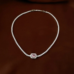 Detail of square pink zircon pendant on a luxury silver choker with pave settings