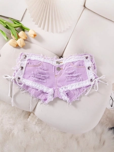 Pantalones cortos vaqueros morados sexys de tiro bajo con cordones blancos y flecos