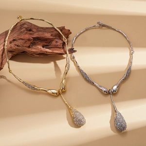 Retro irregular liquid metal teardrop necklaces in gold and silver finish with rhinestones