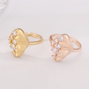 Abstract face profile open rings in gold and rose gold with sparkling zircon stones