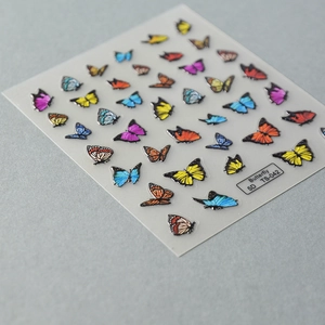 Detailed macro view of 5D embossed butterfly nail stickers model TS-042 with vibrant colors