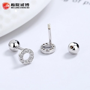 Macro detail of 925 silver round zircon paved hoop earrings with threaded screw backs