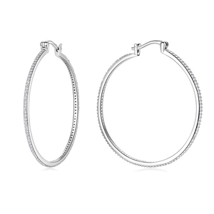 Detailed close-up showing the silver hoop earrings with shimmering pavé cubic zirconia