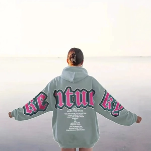 Green American vintage oversized hoodie featuring a large GENTURKY back print for women