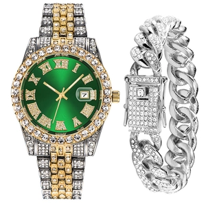 Close-up of iced-out Cuban chain and luxury green dial watch with roman numerals