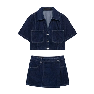 Women's dark blue denim two-piece set with cropped short sleeve shirt and mini skirt