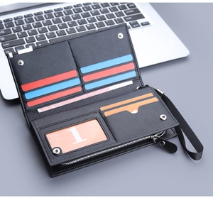 Detail of black long wallet interior with multiple card slots and secure zipper pocket
