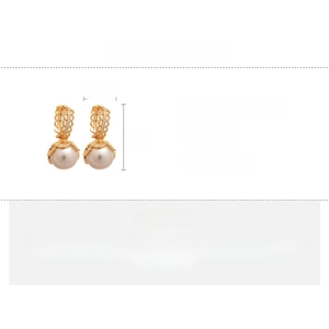 Detail view of retro hollow earrings with pearls and dimensions 3cm by 1.5cm